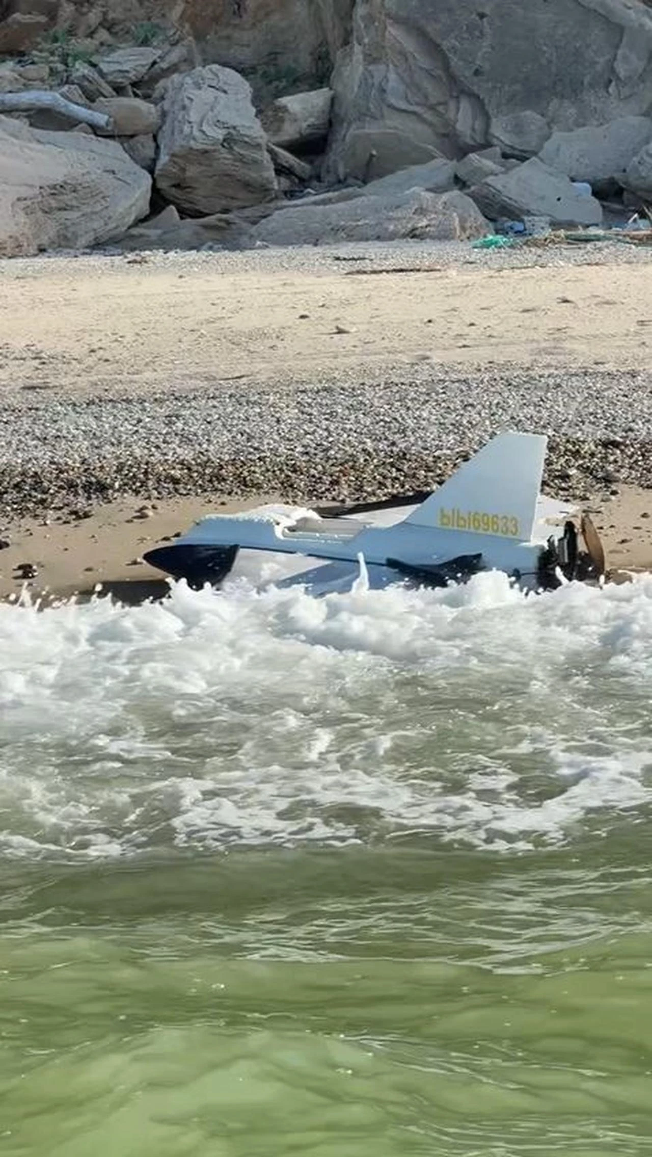 Photo shows the kamikaze drone that washed ashore on the Arnavutkoy Karaburun coast, in Istanbul, Türkiye on July 20, 2026. (IHA Photo)