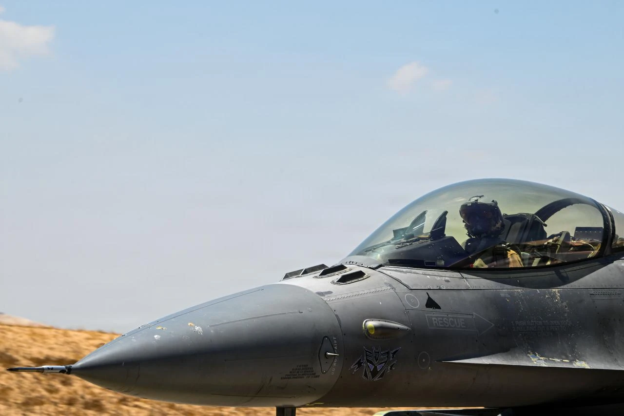 A U.S. Air Force pilot taxis aboard a U.S. F-16 Fighting Falcon aircraft at a base in the U.S. Central Command area of responsibility June 18, 2026. (Photo via U.S. Air Force)