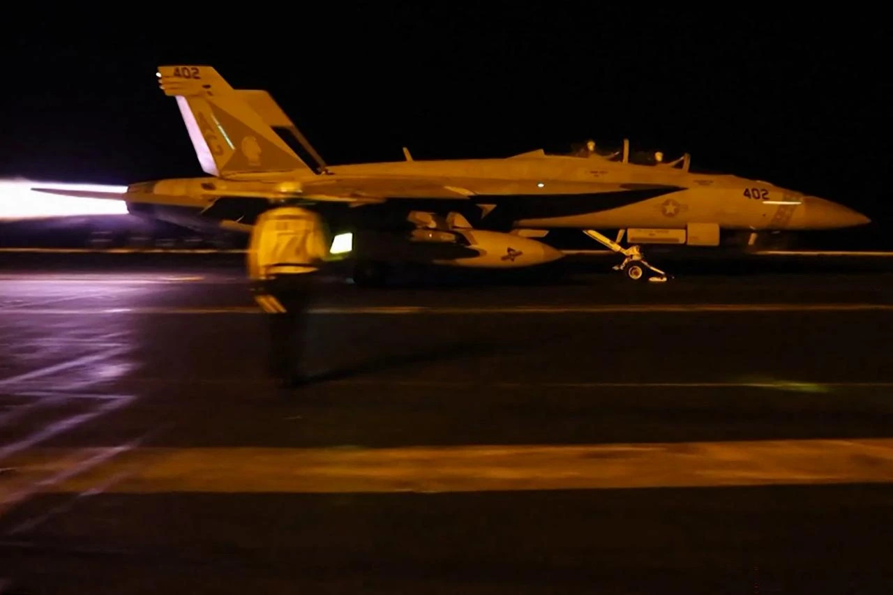 This screen grab made on July 19, 2026 from handout video footage released by the US Central Command (CENTCOM) on July 18, 2026 shows US forces launching what the military says are precision strikes targeting Iranian military capabilities for the eighth consecutive night. (Photo by US Central Command (CENTCOM)/HO/AFP)