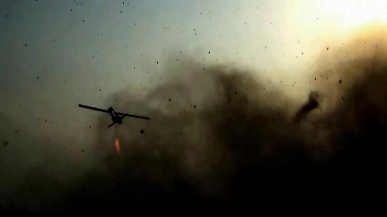 This screen grab taken on July 15, 2026, from video footage released by Iran's Revolutionary Guards (IRGC)'s Sepah News website on July 14, 2026, allegedly shows a drone being launched from an undisclosed location towards US targets in Bahrain and Kuwait. (Photo by SEPAHNEWS.COM/HO/AFP)