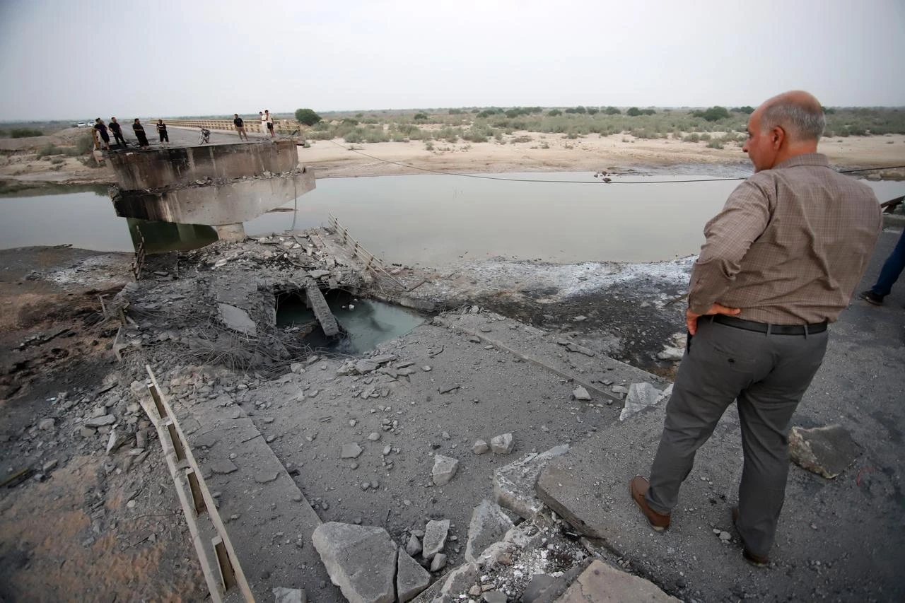 The bridge linking Bandar Abbas and Kehuristan, rendered unusable in a US strike, is seen in Iran's Hormozgan province, where Iranian authorities said the United States carried out attacks on 95 locations across 12 cities over the past 10 days, on July 19, 2026.  (AA Photo)