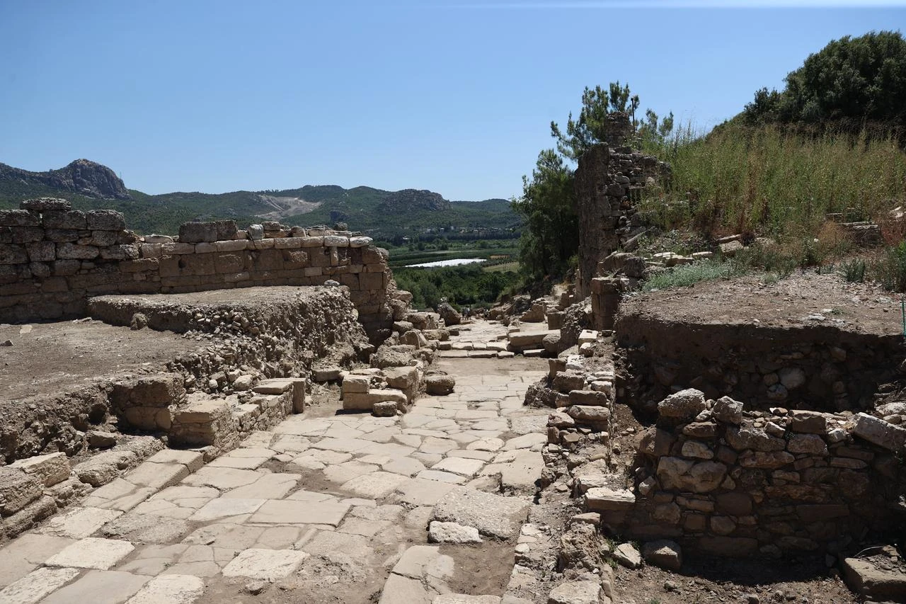 The restored stone-paved main street of the ancient city of Aspendos is seen in Antalya, Türkiye, July 21, 2026. (AA Photo)