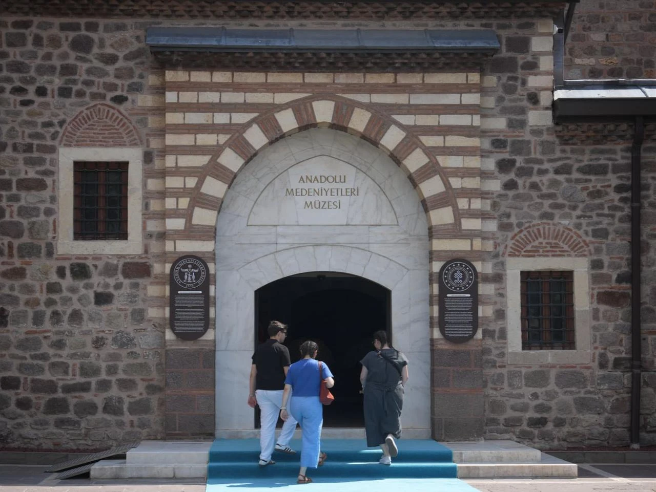 Visitors enter the Museum of Anatolian Civilizations, housed in a historic Ottoman-era complex in Ankara, Türkiye, July 21, 2026. (AA Photo)