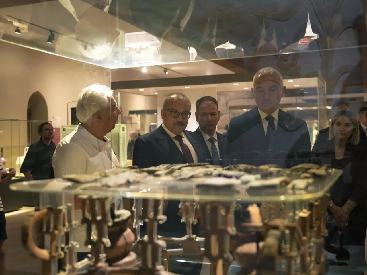 Türkiye’s Culture and Tourism Minister Mehmet Nuri Ersoy and accompanying officials inspect artifacts displayed in the renewed galleries of the Museum of Anatolian Civilizations in Ankara, Türkiye, July 21, 2026. (AA Photo)