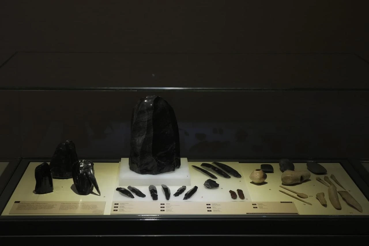 Obsidian tools and other archaeological objects are displayed in a renewed exhibition case at the Museum of Anatolian Civilizations in Ankara, Türkiye, July 21, 2026. (AA Photo)
