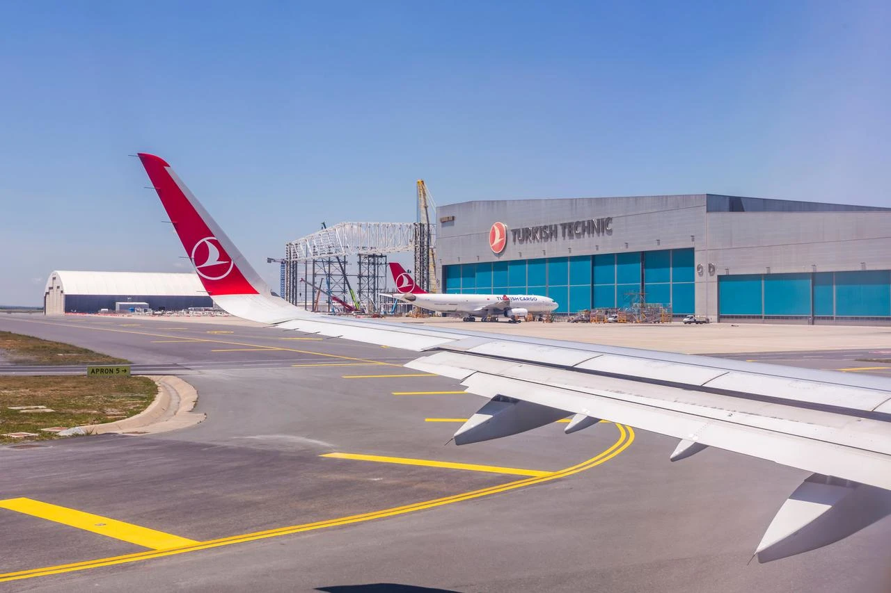 A Turkish Airlines aircraft taxis past Turkish Technic's maintenance facilities at Istanbul Airport in Türkiye. (Adobe Stock Photo)