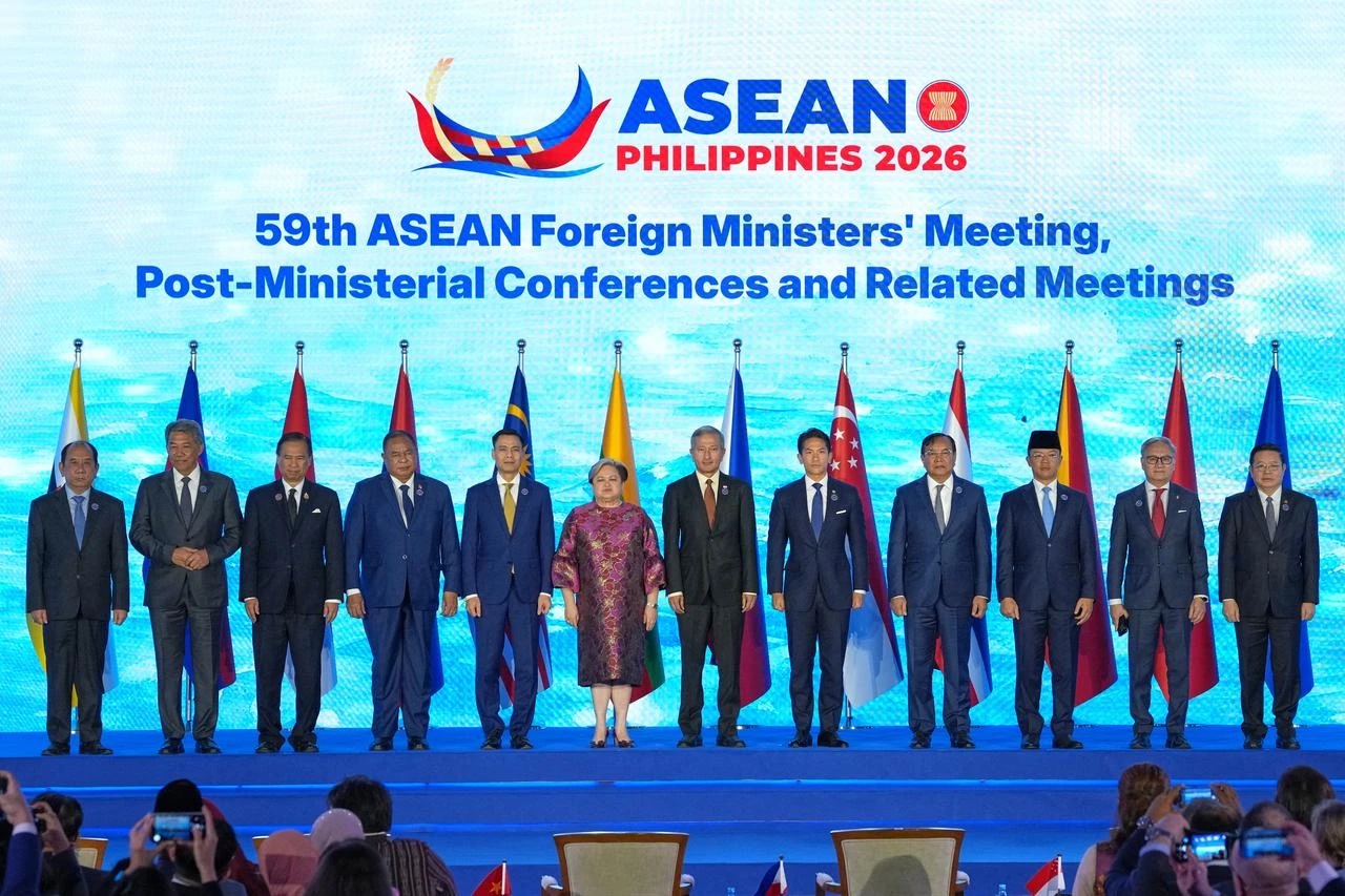 Officials attending the ASEAN Foreign Ministers' Meeting pose for a photo at the Philippine International Convention Center in Pasay, Metro Manila, July 20, 2026. (AFP Photo)