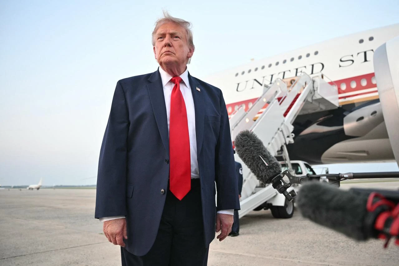 US President Donald Trump speaks to reporters after stepping off Air Force One upon returning to Joint Base Andrews in Maryland, July 19, 2026. (AFP Photo)