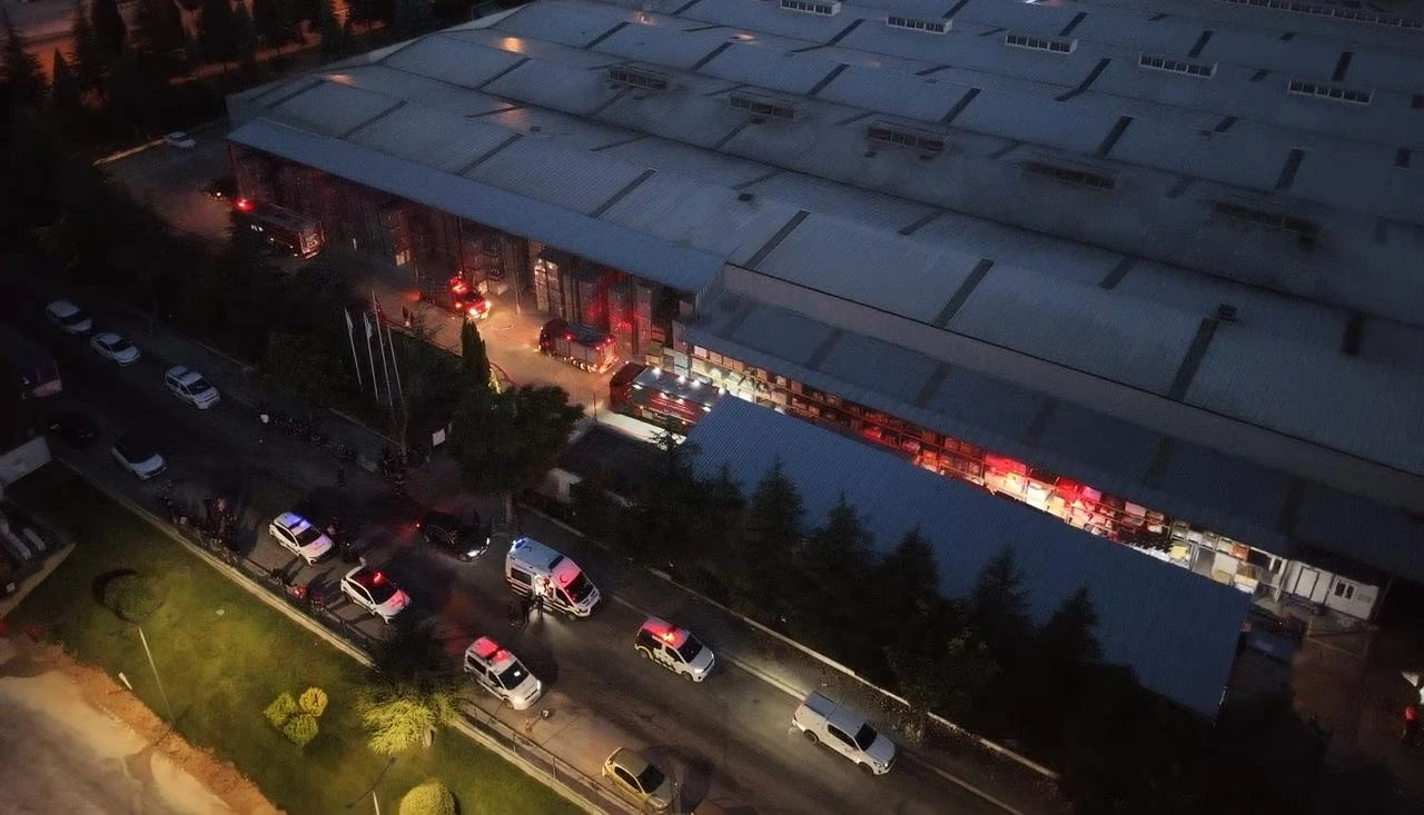 Firefighters and emergency vehicles gather outside a plastic parts factory after a fire left four workers affected by smoke in Odunpazari, Eskisehir, Türkiye, July 17, 2026. (AA Photo)