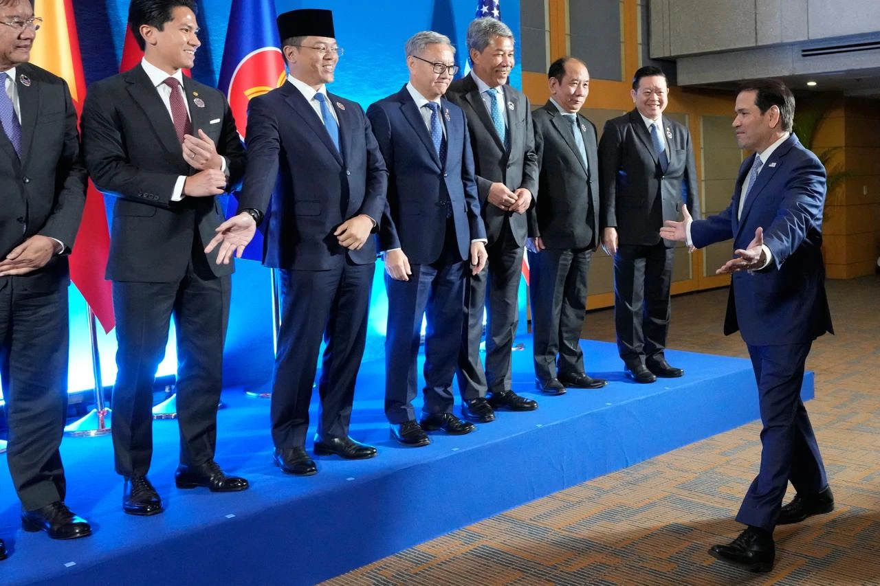US Secretary of State Marco Rubio (R) arrives for a group photo session during the ASEAN Post Ministerial Conference with the US on the sidelines of the Association of Southeast Asian Nations (ASEAN) Foreign Ministers' Meeting in Pasay, Metro Manila, July 22, 2026. (AFP Photo)