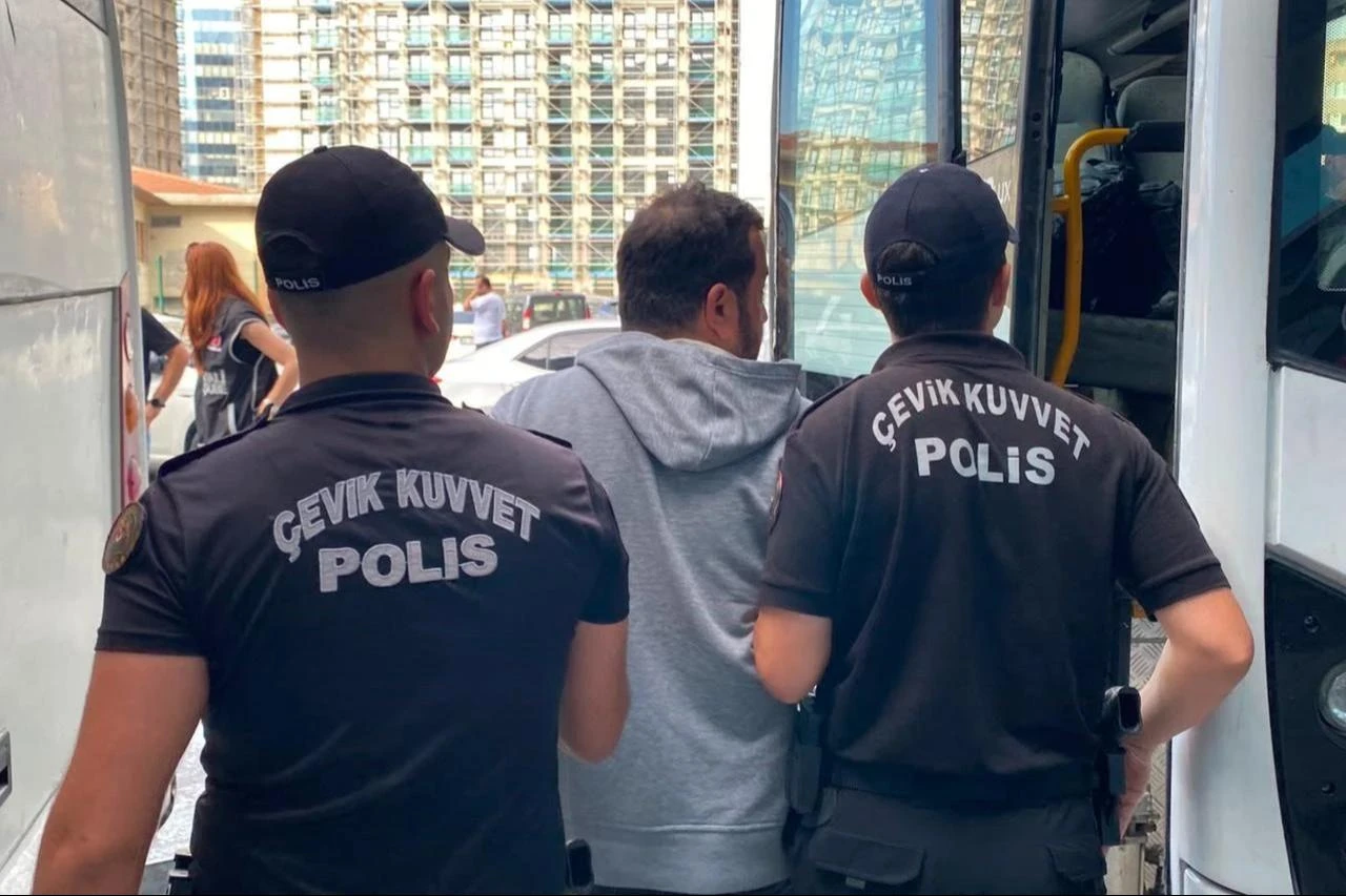 Police escort a detained suspect in an investigation into Ahbap Association to Istanbul courthouse in Istanbul, Türkiye, July 16, 2026. (IHA Photo)