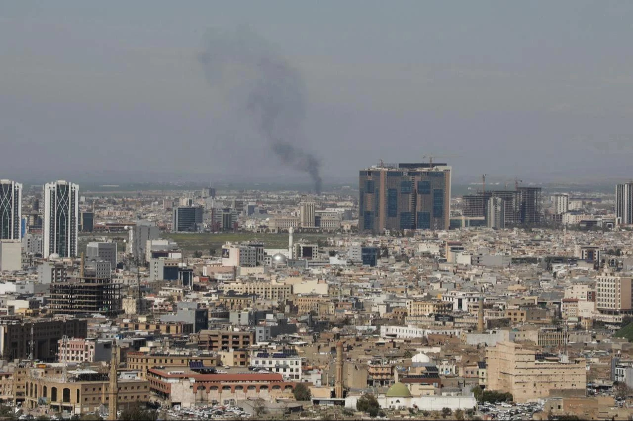 A plume of smoke rises following an interception of a drone in Erbil on March 12, 2026. (AFP Photo)