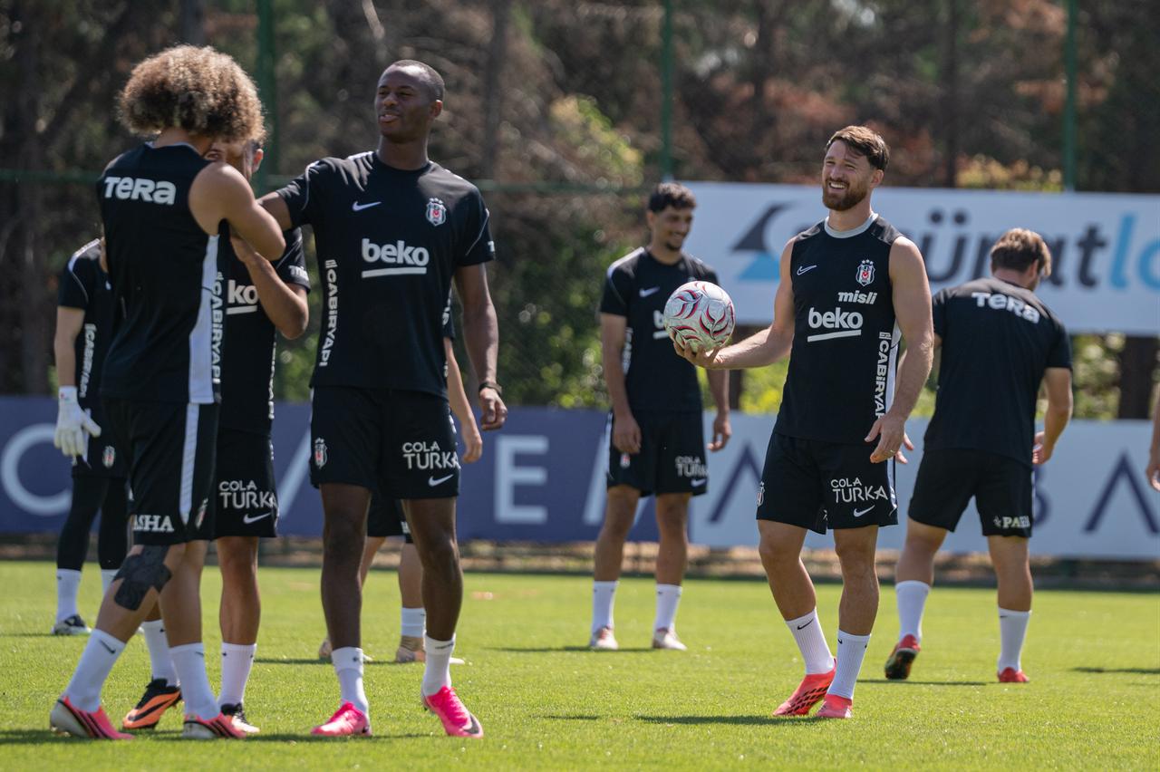 Tiago Djalo (L) and Salih Ozcan (R) of Besiktas attend a training session under the lead of head coach Vincenzo Italiano ahead of the Midtjylland clash as part of UEFA Europa League second qualifying round, at BJK Nevzat Demir Facilities in Istanbul, Türkiye on July 22, 2026. (AA Photo)