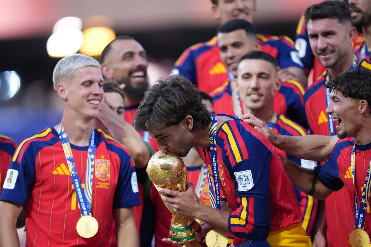 Ferran Torres of Spain celebrates with the trophy after winning the 2026 FIFA World Cup final match between Spain and Argentina at the New York/New Jersey Stadium in East Rutherford on July 19, 2026. (AA Photo)