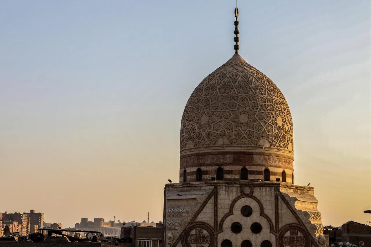 The intricately carved dome of Mamluk Sultan Al-Ashraf Qaitbay’s mausoleum rises above Cairo’s historic Gamaliya district, Egypt, July 21, 2026. (AA Photo)