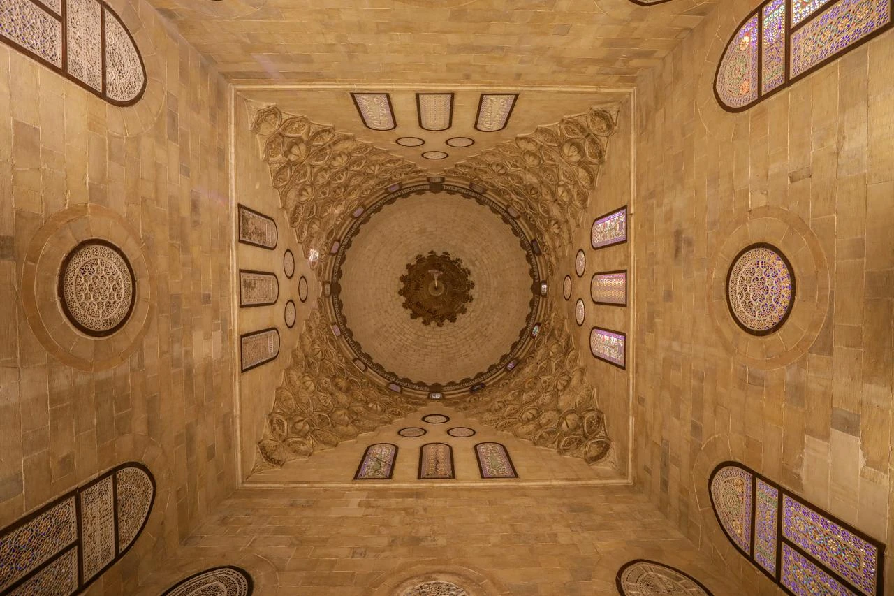 Decorative stonework and stained-glass windows frame the interior of the restored dome at Sultan Al-Ashraf Qaitbay’s mausoleum in Cairo, Egypt, July 21, 2026. (AA Photo)