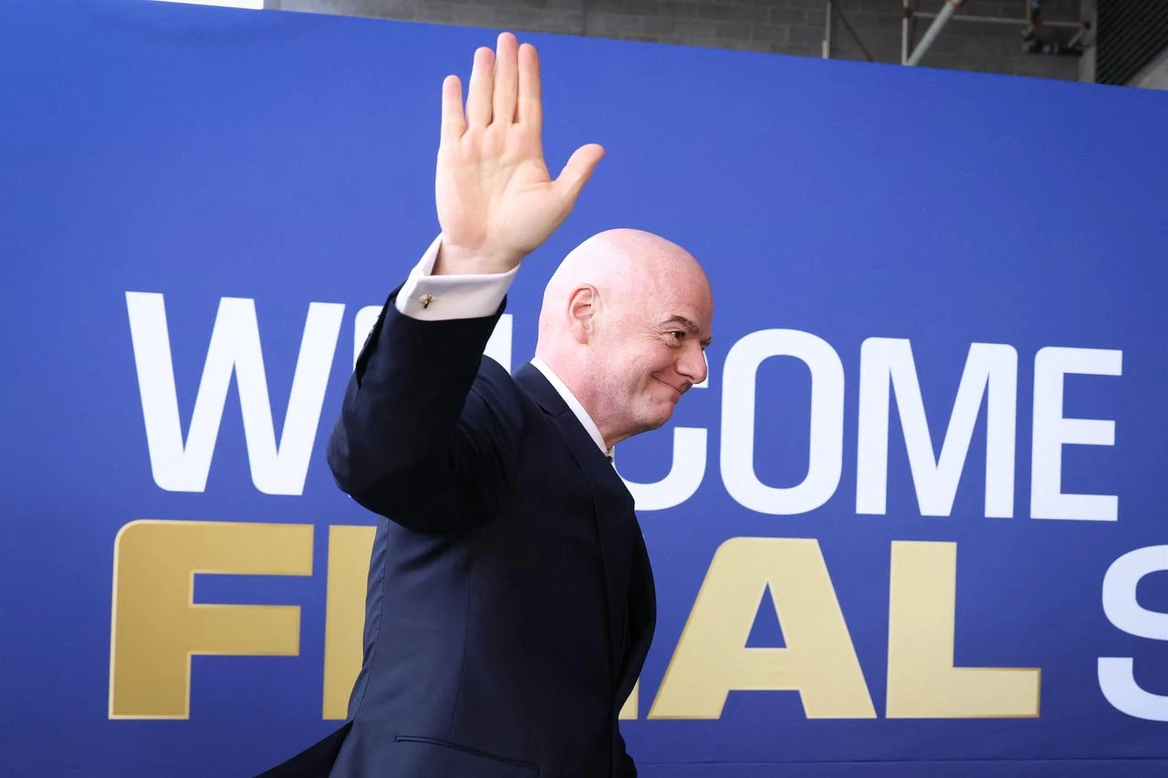 FIFA President Gianni Infantino waves as he arrives for the 2026 World Cup football tournament final match between Spain and Argentina at the New York/New Jersey Stadium in East Rutherford on July 19, 2026. (AFP Photo)
