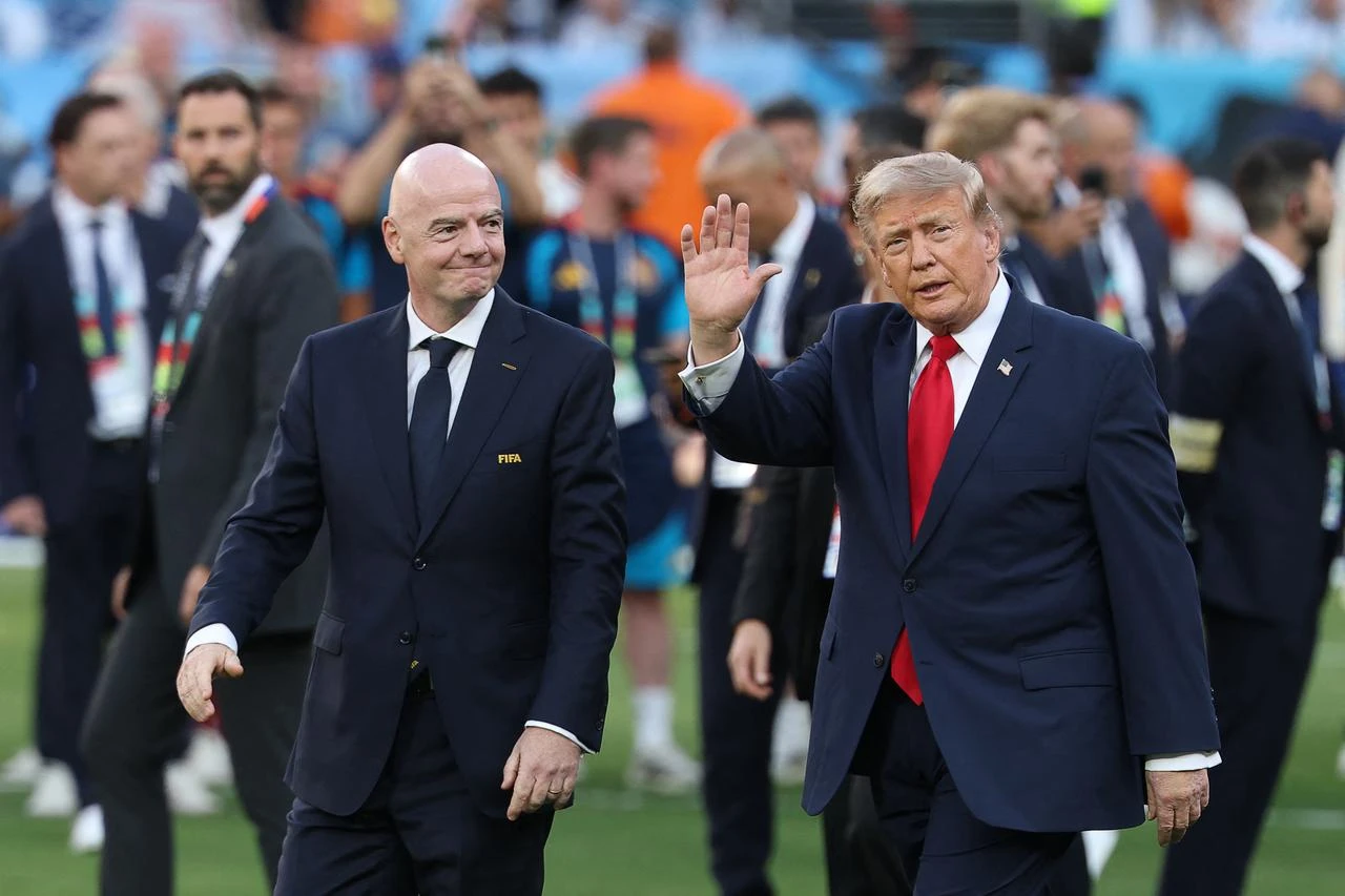 FIFA President Gianni Infantino (L) and US President Donald Trump arrive for the final ceremony after the 2026 World Cup football tournament final match between Spain and Argentina at the New York/New Jersey Stadium in East Rutherford on July 19, 2026. (AFP Photo)