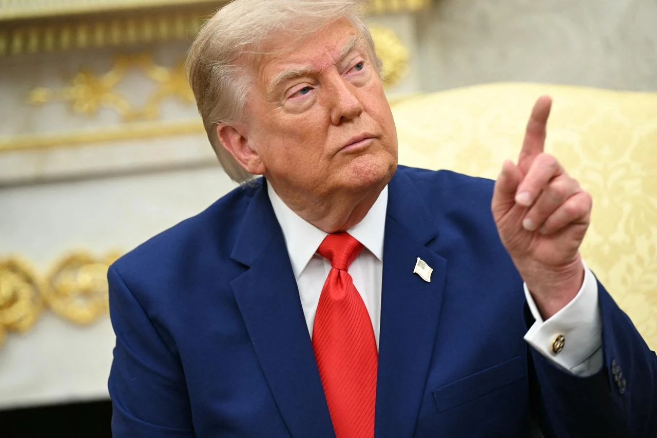 Trump vows to destroy a bridge, power plant for every ship Iran targets