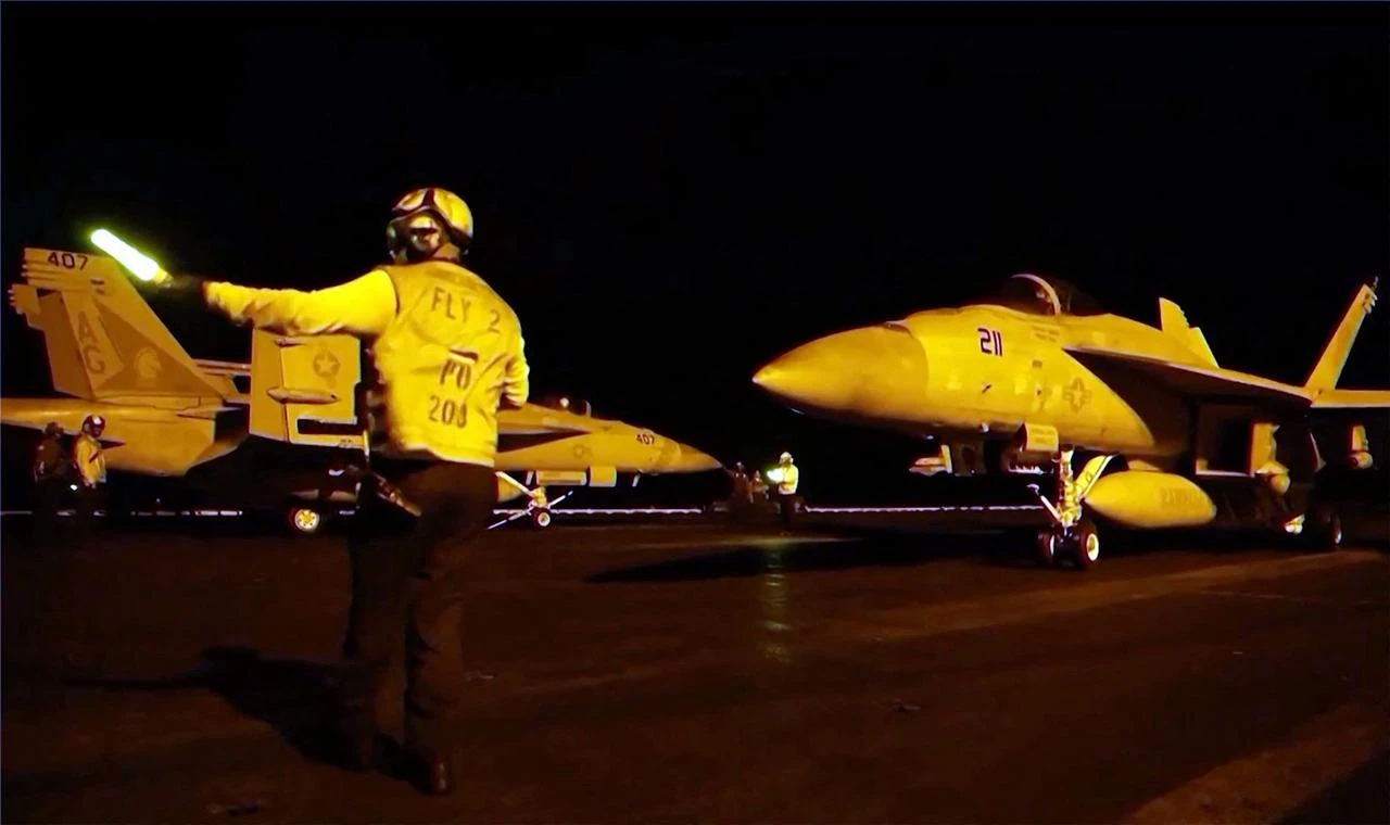 This screen grab taken from handout video shows U.S. forces carrying out precision strikes against Iranian military targets during the 11th consecutive night of the U.S. air campaign on July 21, 2026. (AFP Photo)
