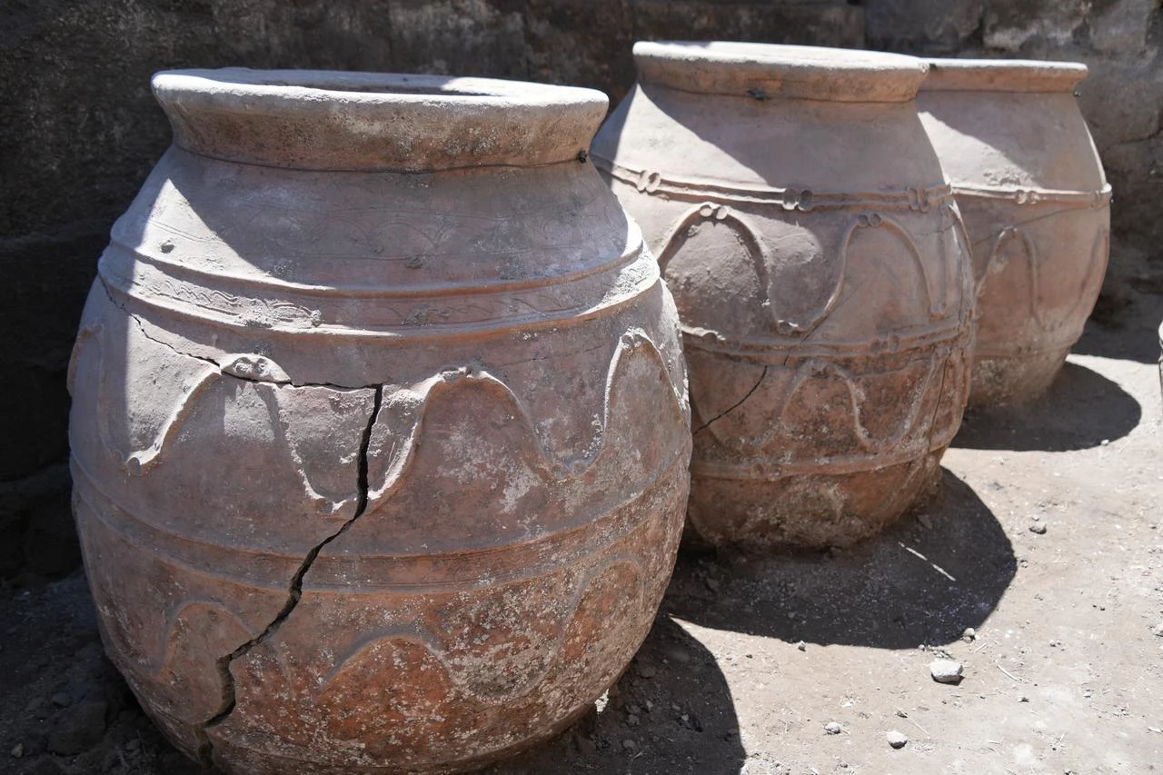 Large Seljuk-era ceramic storage jars decorated with applied S-shaped motifs are seen at the Ani archaeological site in Kars, eastern Türkiye, July 23, 2026. (AA Photo)