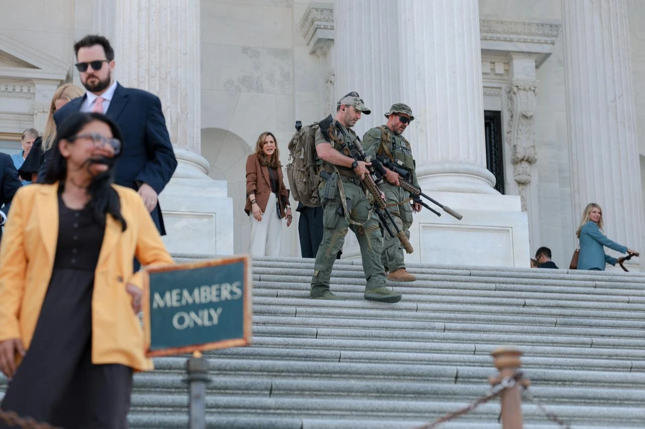U.S. Capitol Police counter-snipers walk down the House Steps after a series of votes at the U.S. Capitol on July 22, 2026, in Washington, DC. (AFP Photo)