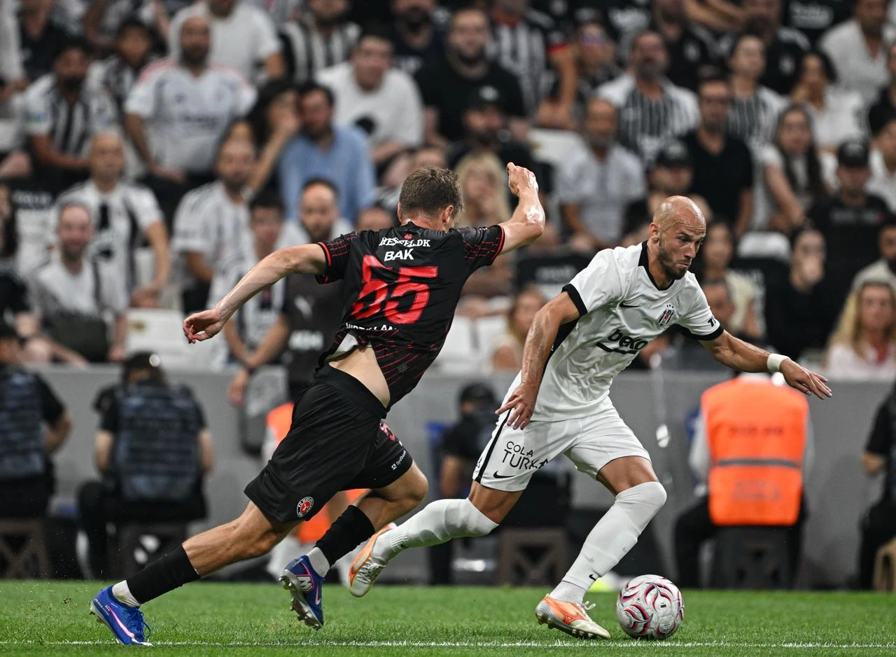 Vaclav Cerny (18) of Besiktas competes for the ball against Victor Bak Jensen (55) of Midtjylland during the UEFA Europa League second qualifying round first-leg match between Besiktas and Midtjylland at Tupras Stadium in Istanbul, Türkiye on July 23, 2026. (AA Photo)