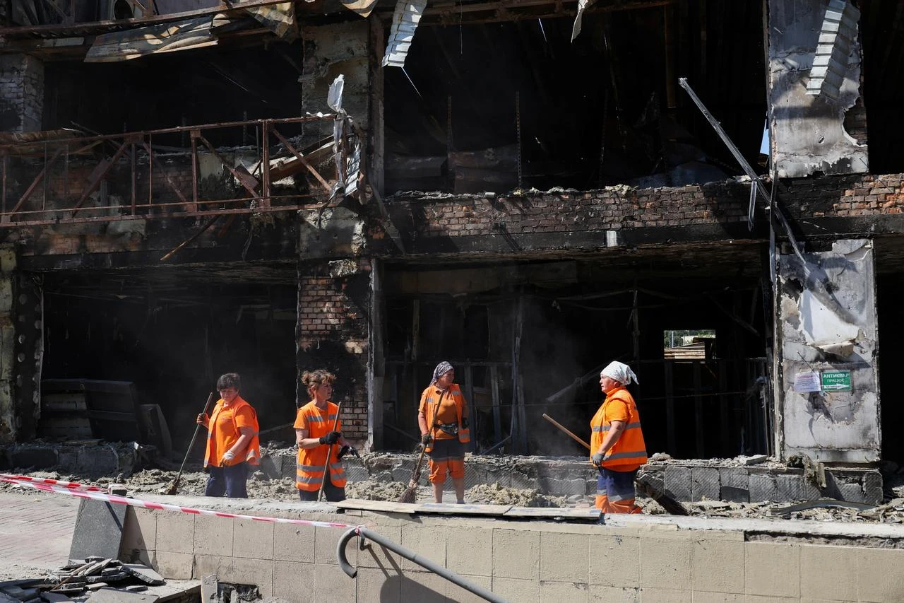 Explosions rock Kyiv after Russia launches rare daytime missile attack