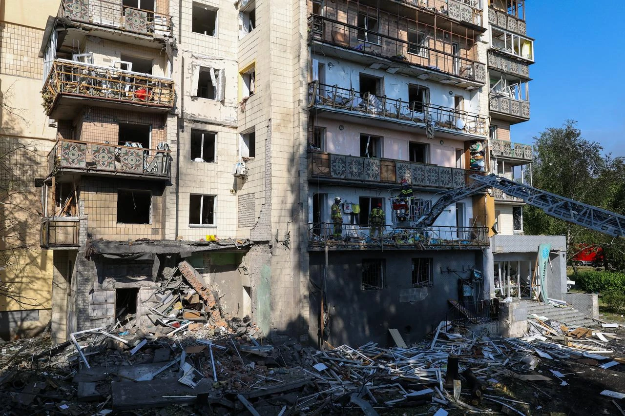 Rescuers work on a residential building  following a Russian missile strikes in Kyiv on July 19, 2026, amid the Russian invasion of Ukraine. (AFP Photo)
