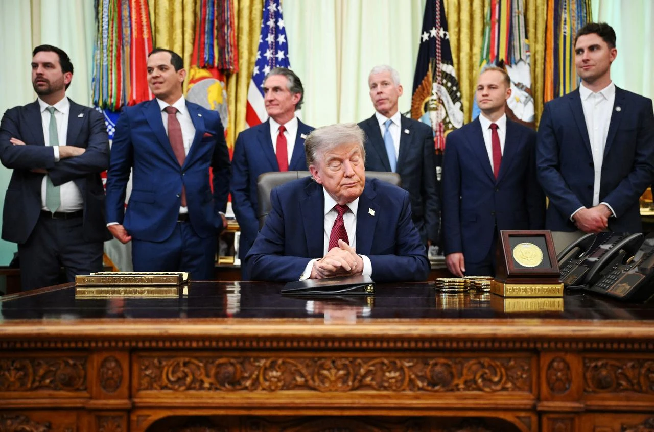 US President Donald Trump looks down as the media is ushered out of the Oval Office after speaking during an announcement on "American Nuclear innovation" at the White House in Washington, DC, July 24, 2026. (AFP Photo)
