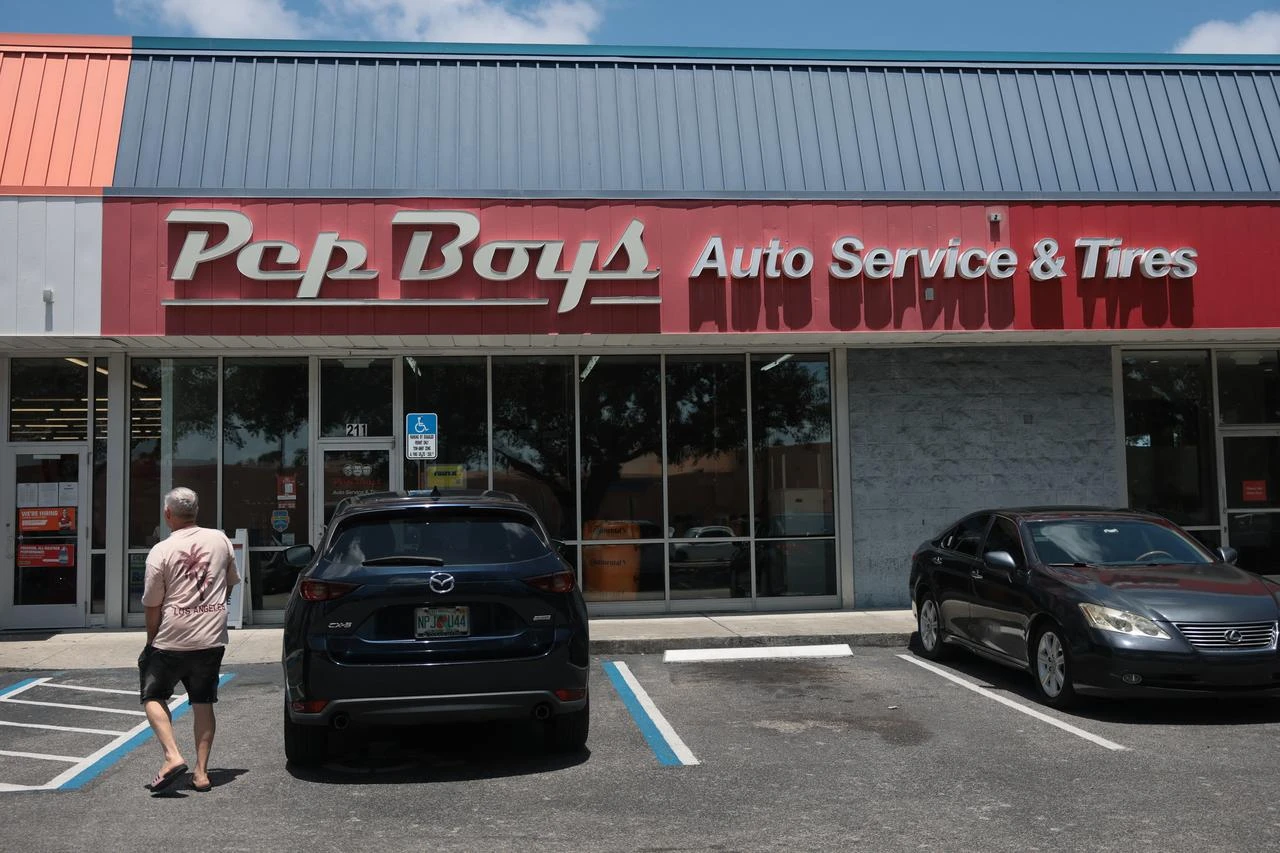 A Pep Boys sign is seen on the outside of the auto service and tire store on July 21, 2026, in Miami, Florida. (AFP Photo)