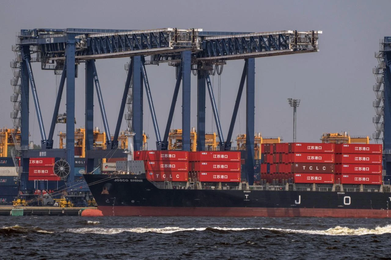 A container ship is docked at the international cargo terminal in Tokyo on July 22, 2026. (AFP Photo)