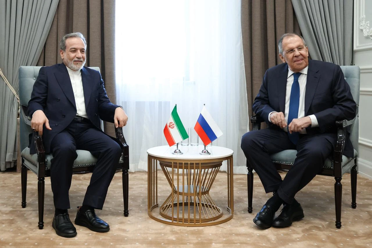 Russia's Foreign Minister Sergei Lavrov (R) and Iran's Foreign Minister Abbas Araghchi attend their talks on the sidelines of the Meeting of the Council of Ministers of Foreign Affairs of the SCO Member States in Cholpon-Ata, northeastern Kyrgyzstan, July 24, 2026. (AFP Photo)