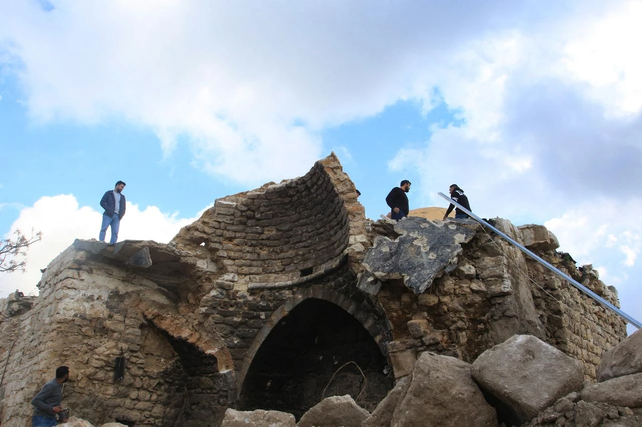 People check the damage at the shrine of Shamoun al-Safa, built within a historical castle in the village of Shamaa in southern Lebanon's Tyre governorate, on January 31, 2025. (AFP File Photo)