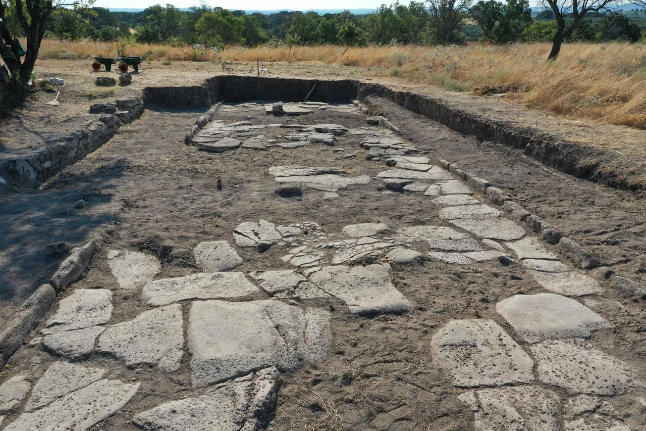 Archaeologists work on the remains of a Roman street at the UNESCO-listed ancient city of Troy in Canakkale, Türkiye, July 25, 2026. (AA Photo)
