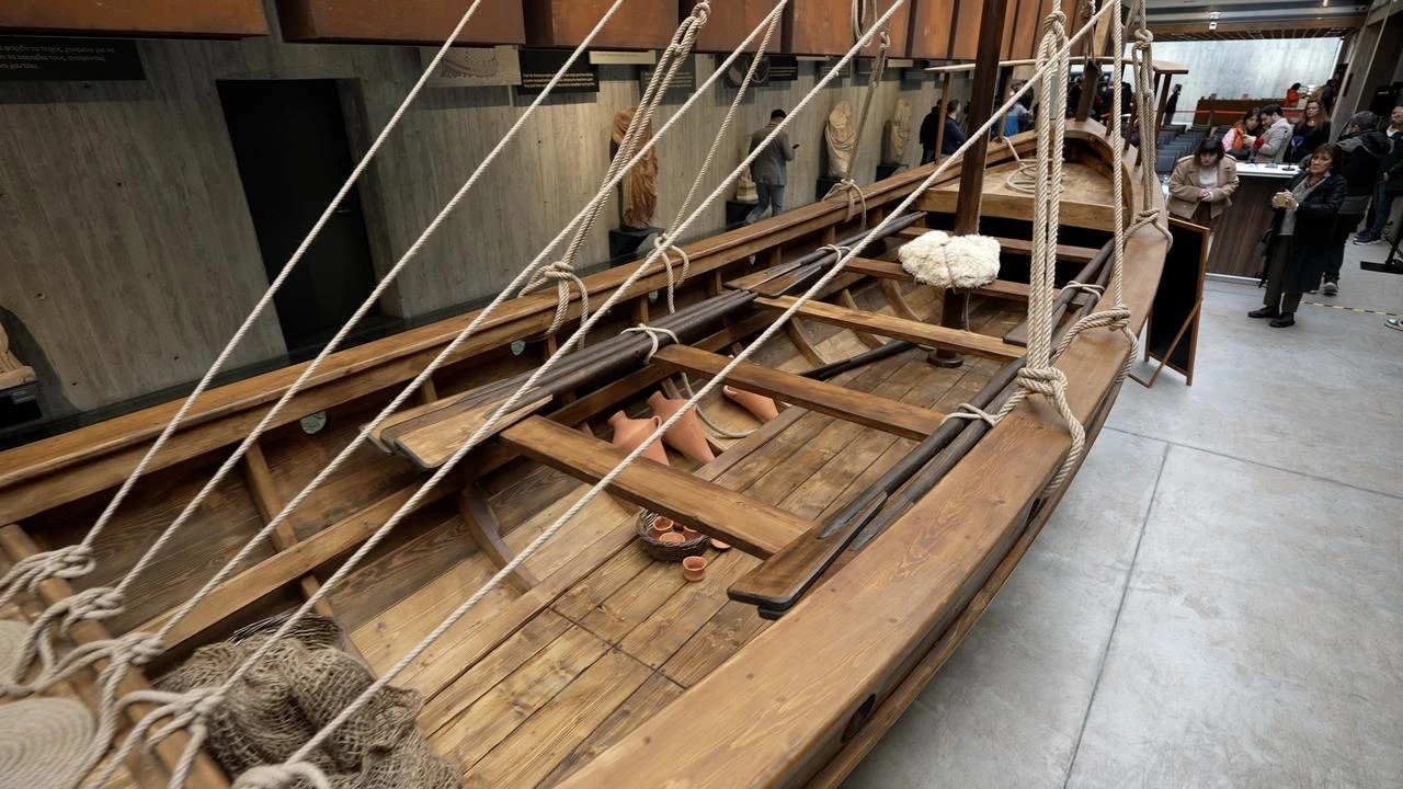 The interior of the reconstructed ancient boat at the Troy Museum showcases traditional rowing benches, wooden fittings and maritime equipment inspired by Homer's time in Canakkale, Türkiye. (AA Photo)