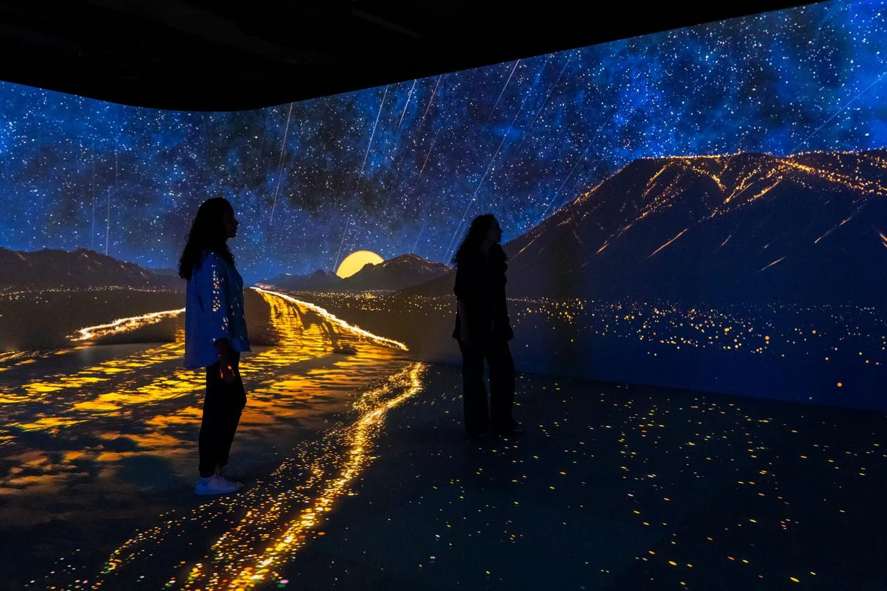 Visitors walk through an immersive recreation of Gobeklitepe at the Timewalk Exhibition in London, United Kingdom. (AA Photo)