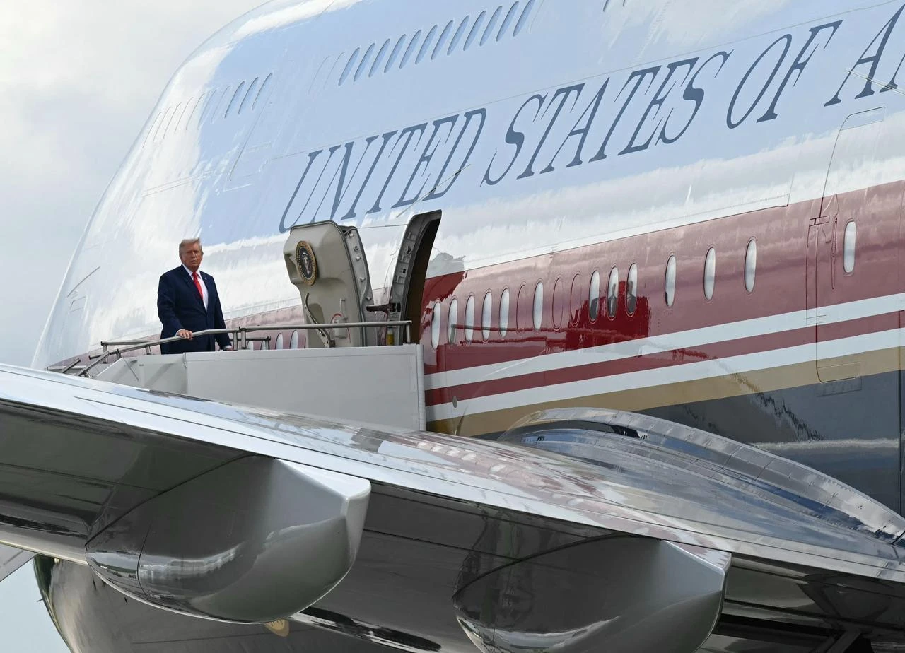 US President Donald Trump boards Air Force One at Dobbins Air Reserve Base in Marietta, Georgia, on July 22, 2026. (AFP Photo)