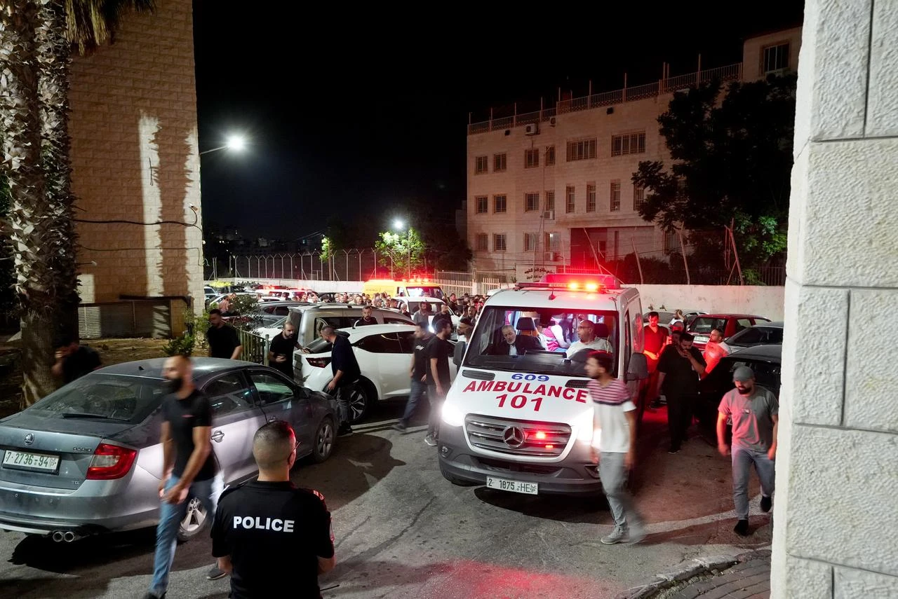 The bodies of Palestinians killed in an attack by Israeli settlers on the town of Tel, west of Nablus in West Bank, are brought to the morgue of Rafidia Hospital in Nablus, West Bank on July 25, 2026. (AA Photo)