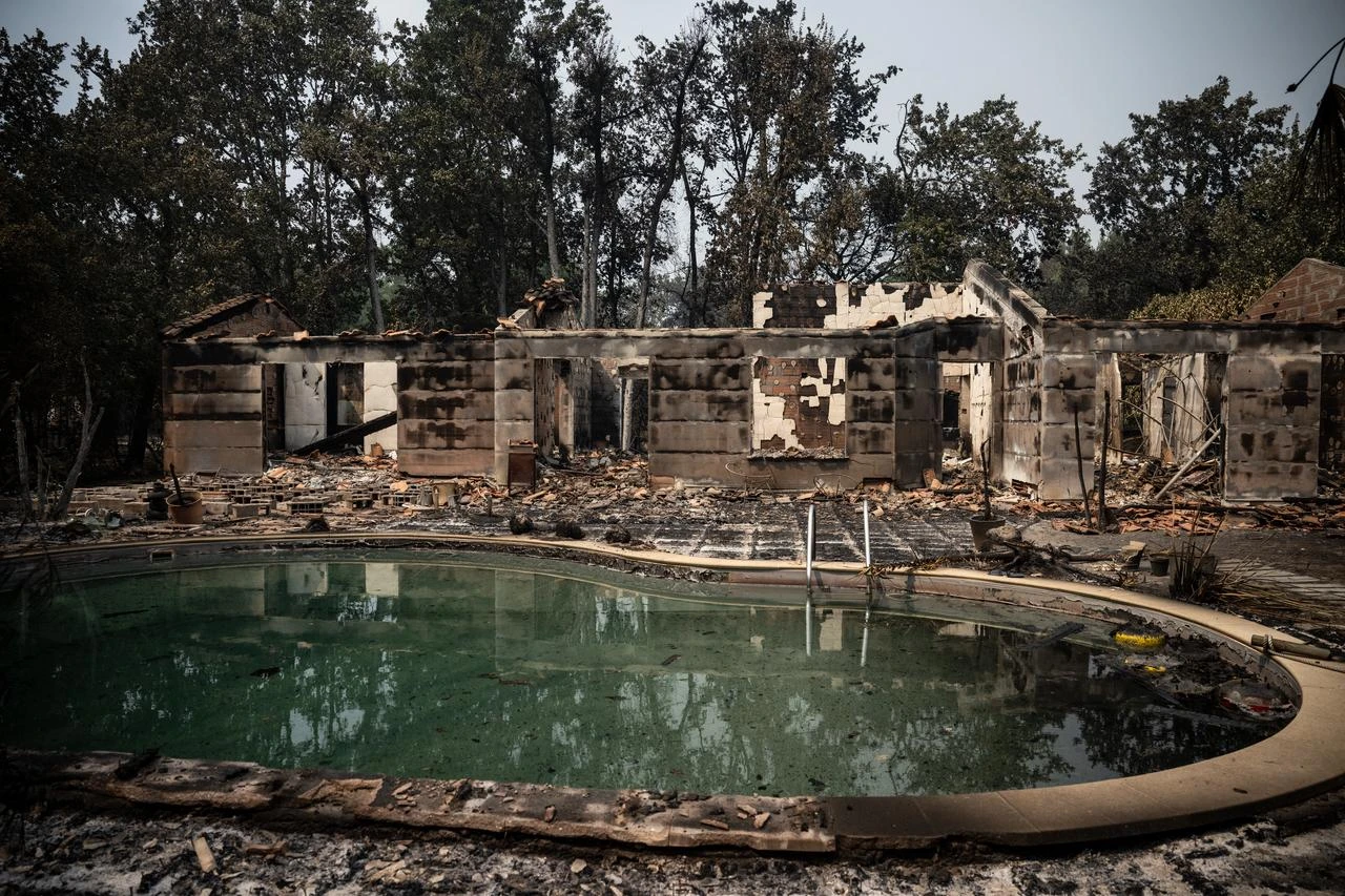 Burnt residential area following a wildfire in Le Porge, in the Gironde Department, south-western France on July 25, 2026. (AFP Photo)