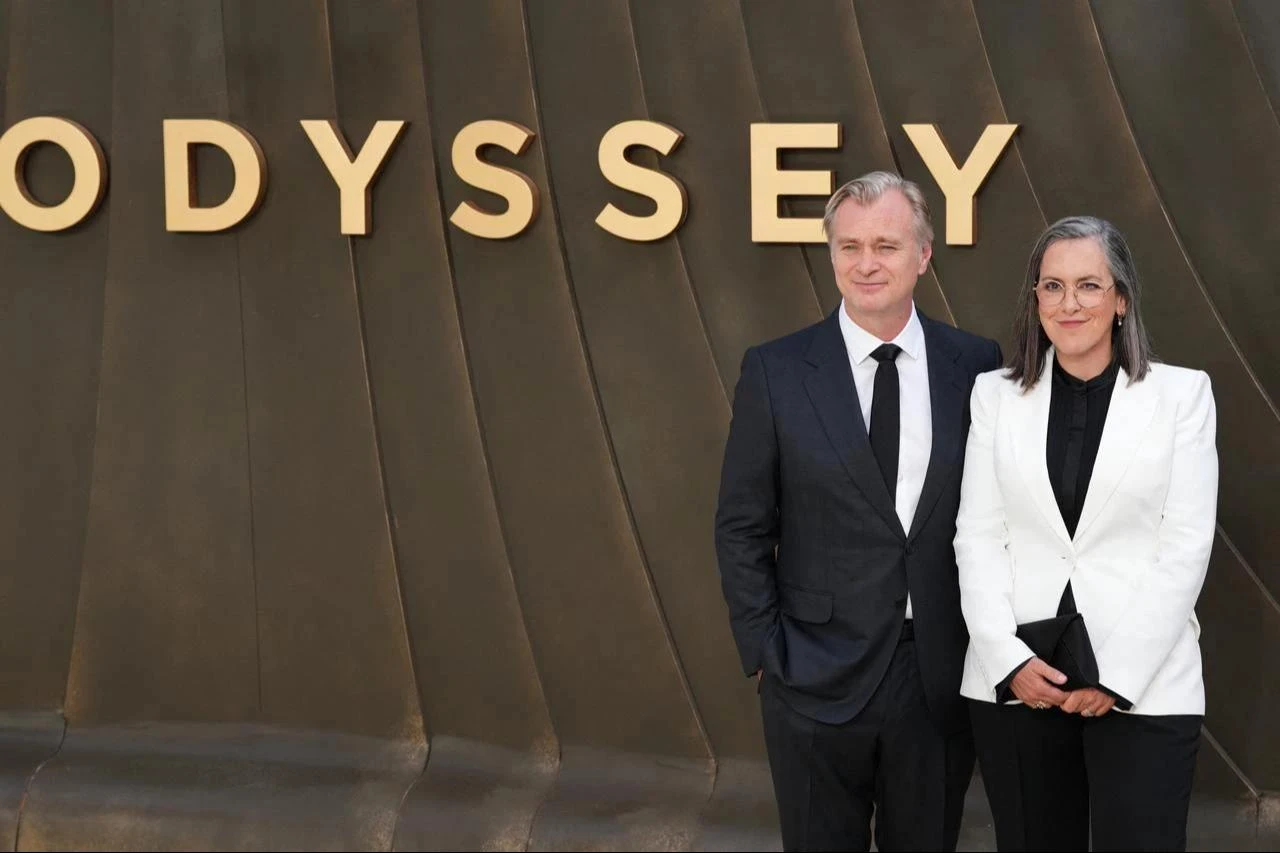 British-US film director Christopher Nolan and British film producer EmmaThomas pose on the red carpet upon arrival to attend the world premiere of the film 'The Odyssey' in London, England, July 6, 2026. (AFP Photo)