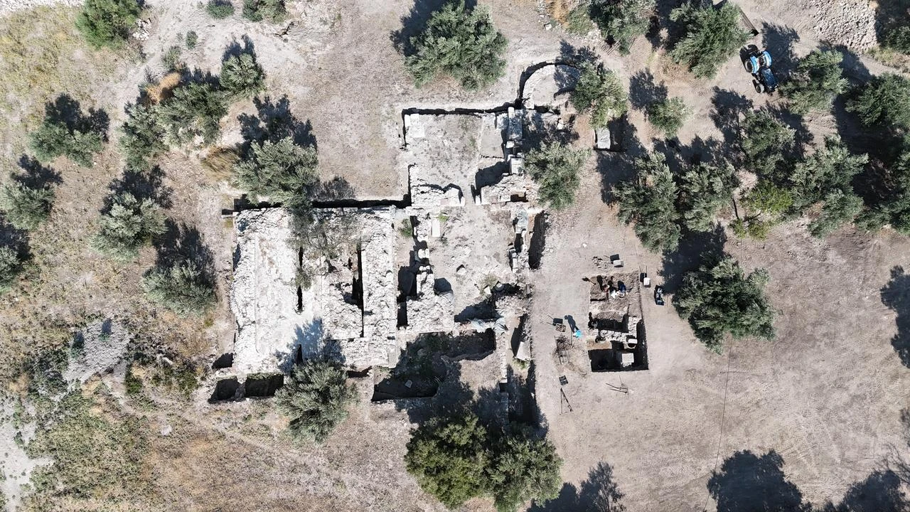 An aerial view shows the Western Bath complex where Christian settlement layers were uncovered at the Apollo Smintheus Sanctuary in Canakkale, Türkiye, July 2026. (IHA Photo)