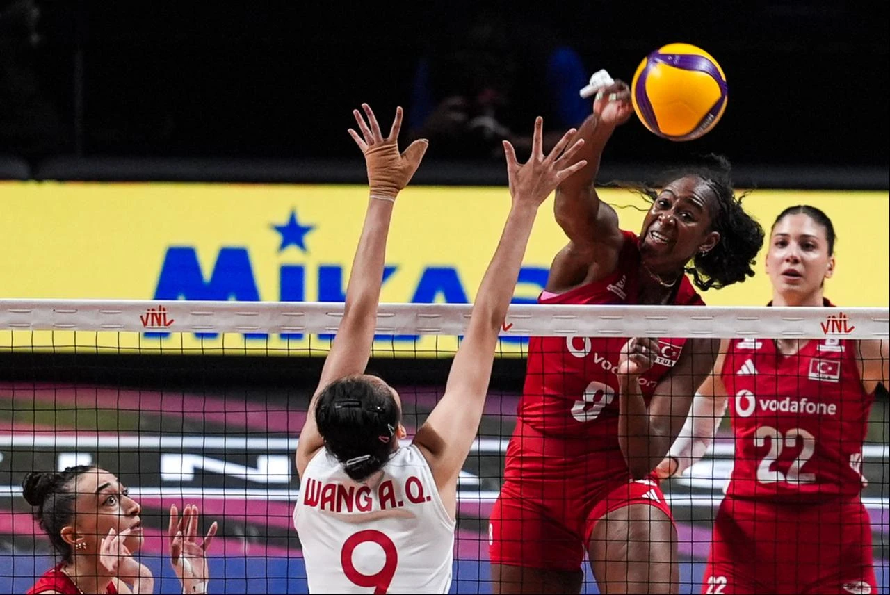 Türkiye national volleyball player Sinead Jack-Kısal #8 attacks against China during the 2026 FIVB Volleyball Nations League in Macao, China, July 25, 2026. (AA Photo)
