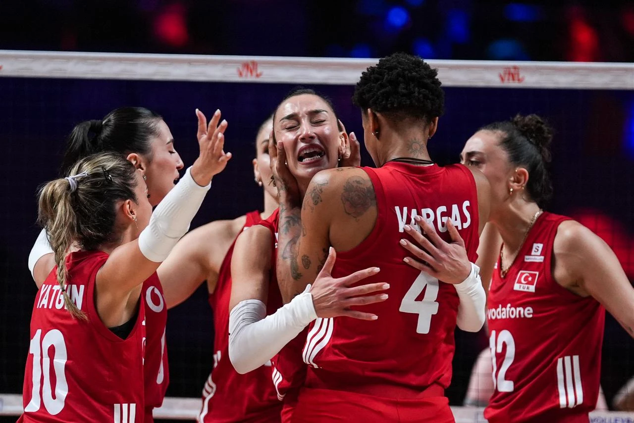 Players of Türkiye celebrate after scoring a point during the 2026 FIVB Volleyball Nations League (VNL) women's final match between Türkiye and Brazil at the East Asian Games Dome in Macao, China, on July 26, 2026. (AA Photo)