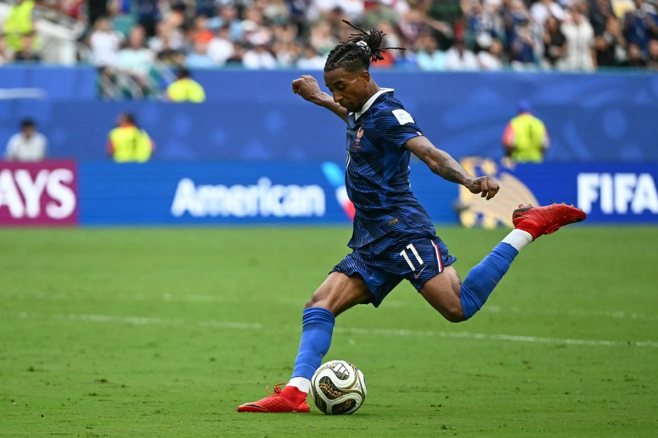 France's forward #11 Michael Olise shoots during the 2026 World Cup football tournament third-place match between France and England at the Miami Stadium in Miami on July 18, 2026. (AFP Photo)