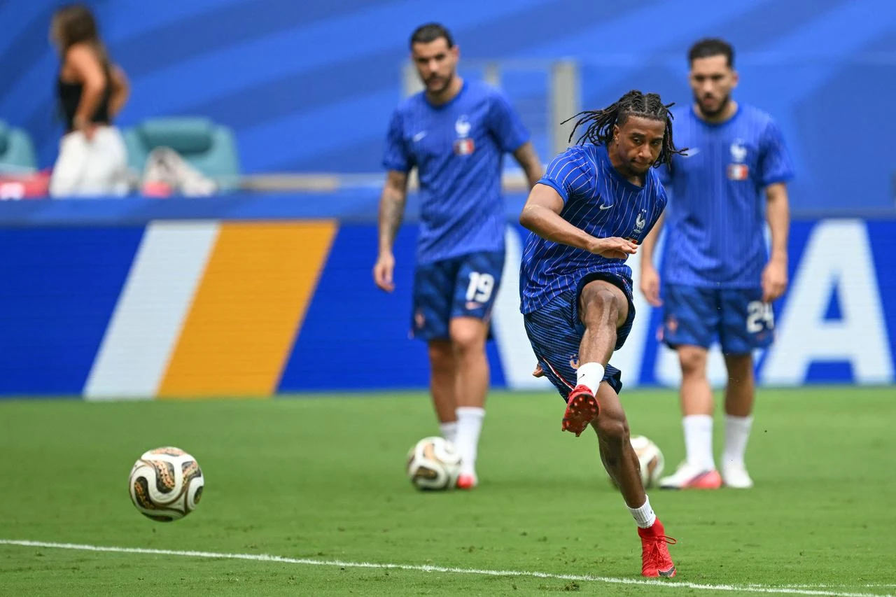 France's forward #11 Michael Olise warms up ahead of the 2026 World Cup football tournament third-place match between France and England at the Miami Stadium in Miami on July 18, 2026. (AFP Photo)