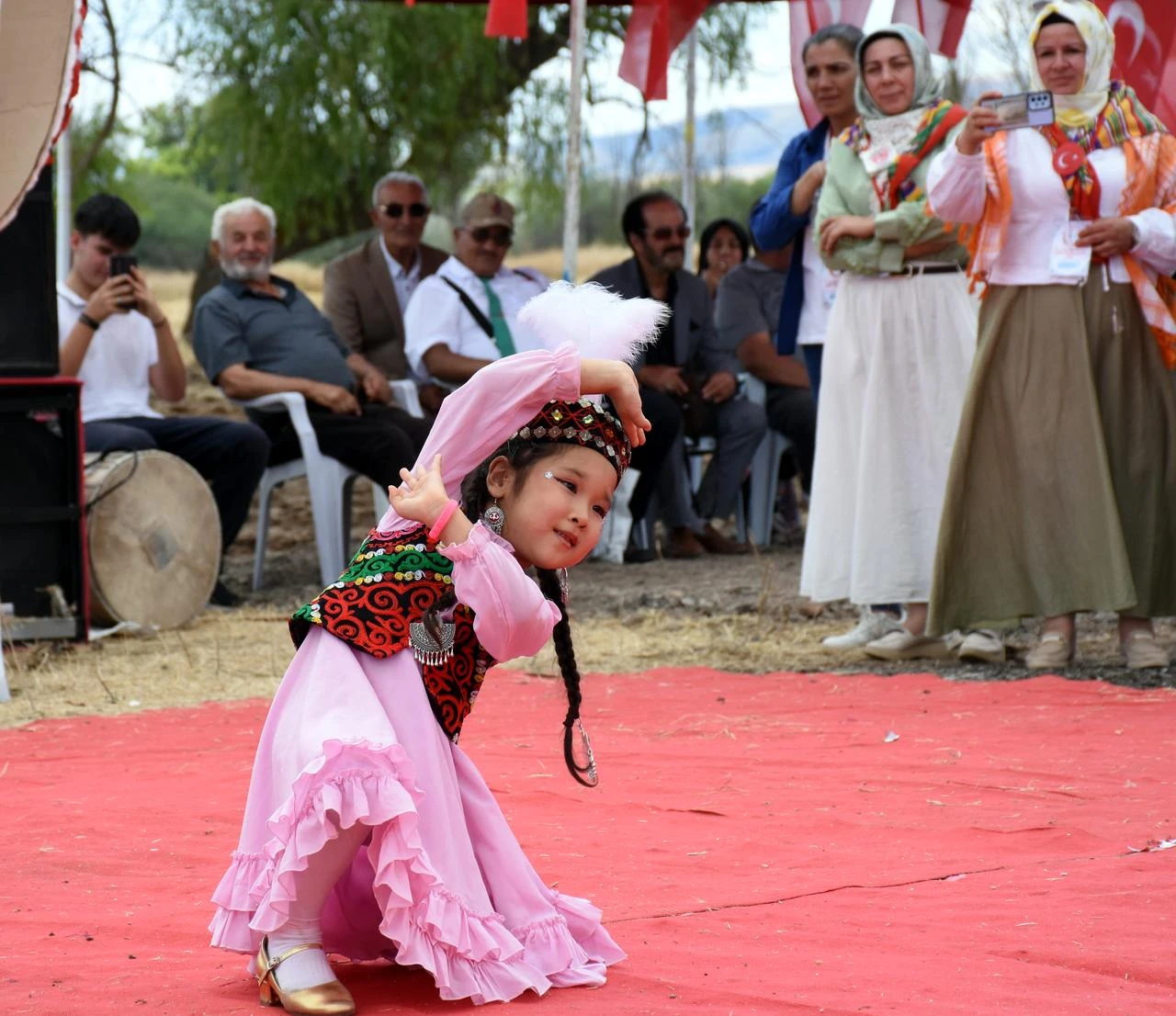 A child wearing traditional attire dances before spectators during the 6th Traditional Yörük-Türkmen Festival in Kırıkkale, Türkiye, July 26, 2026. (AA Photo)