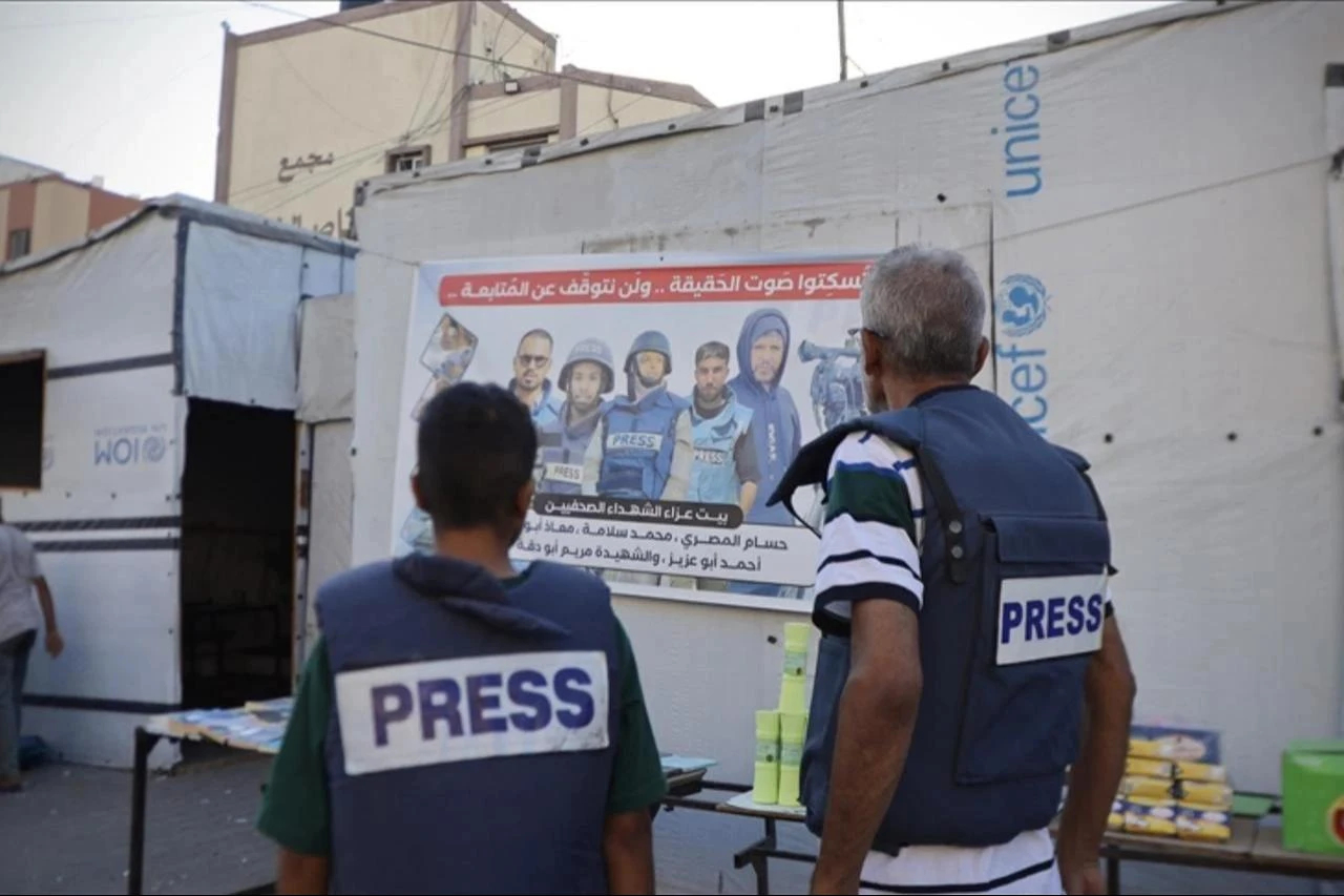 Palestinian journalist passing on his journalistic experience to his 15-year-old nephew under Israeli attacks in Khan Yunis, Gaza, September 1, 2025. (AA Photo)