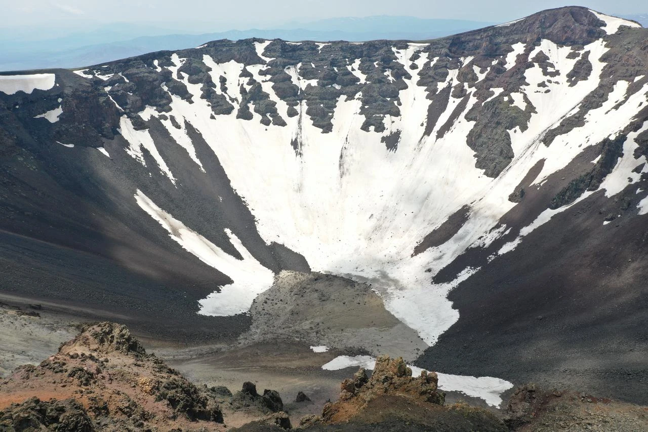 A panoramic view shows snow-covered sections of Tendürek Crater in eastern Türkiye, July 27, 2026. (AA Photo)