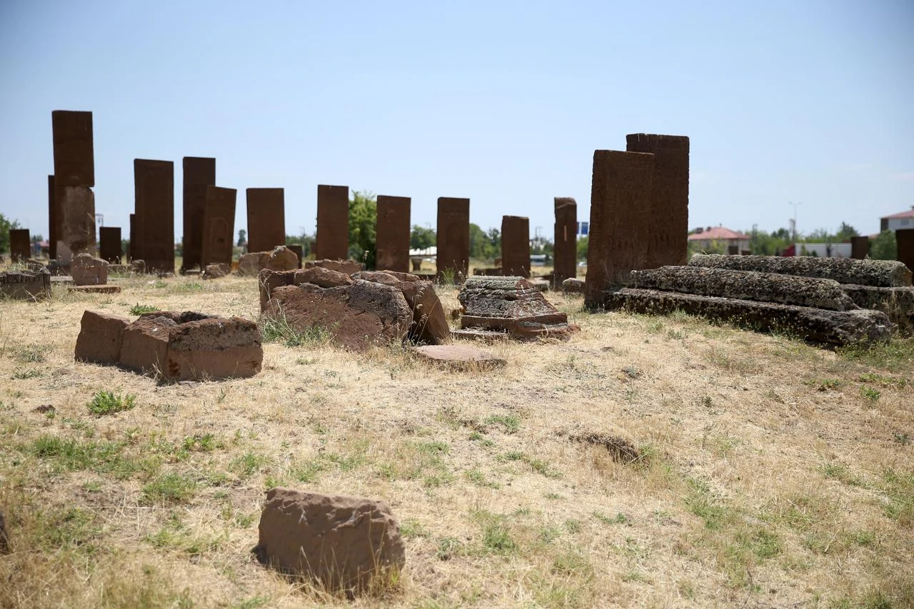 Newly unearthed graves and historic tombstones are seen at the Seljuk Square Cemetery in Ahlat, Bitlis, Türkiye, July 28, 2026. (AA Photo)